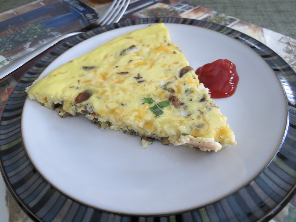 A nice wedge of frittata with a side of ketchup.  It's a must in our home.