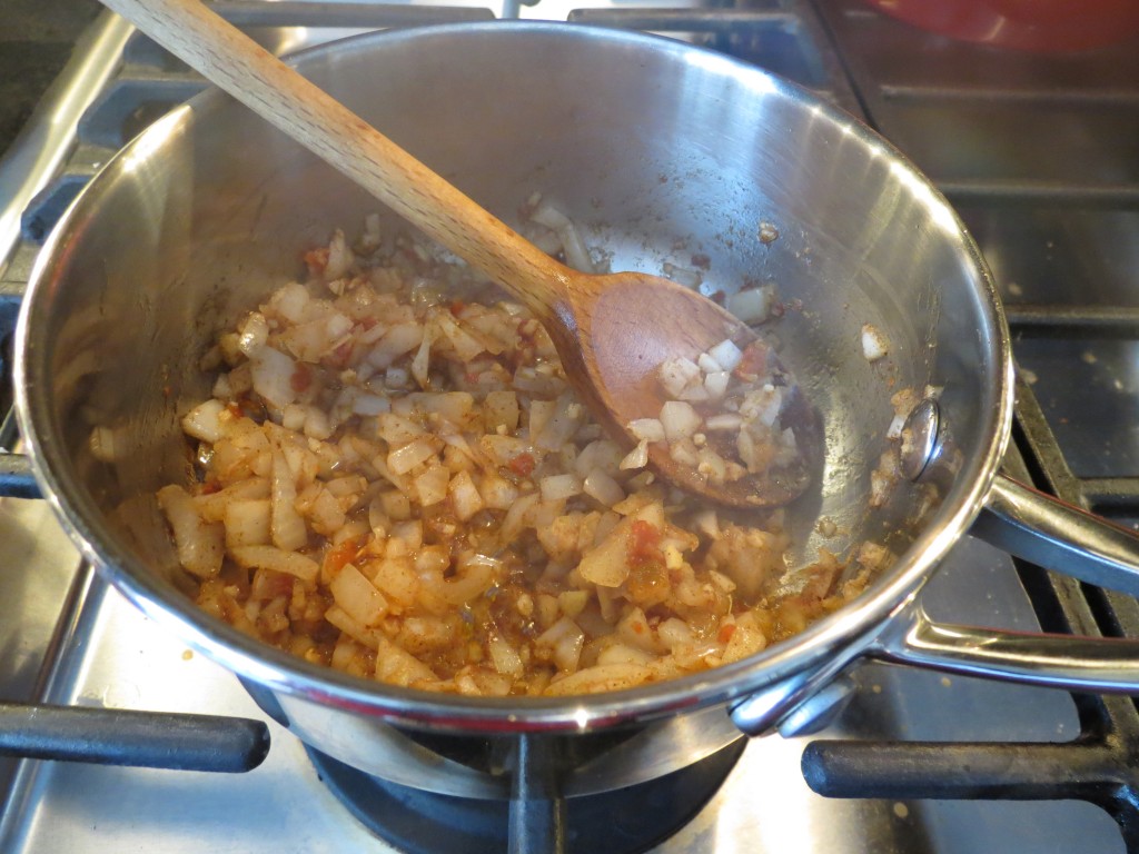 Once the onion has softened, add the spices.  Your kitchen will smell amazing!
