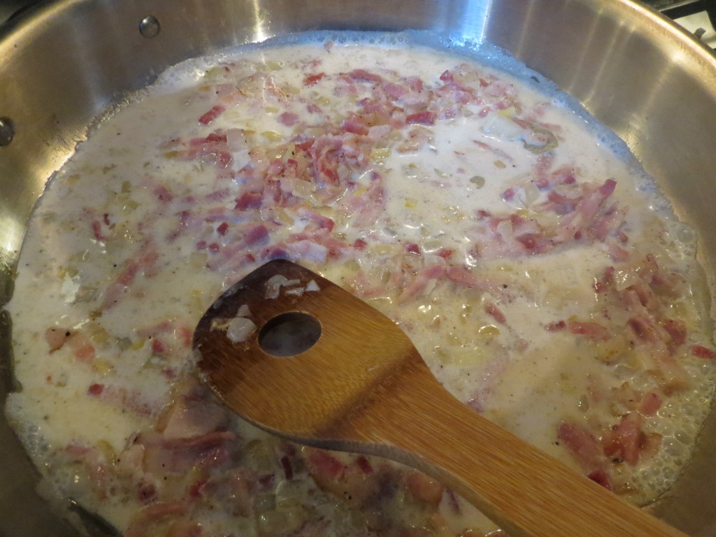 Adding the cream to the bacon and onions just makes it better.  Trust me.