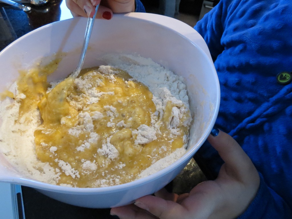 My daugther is mixing the batter ingredients all by herself.  When she heard the word brownie, she was all over me in the kitchen.