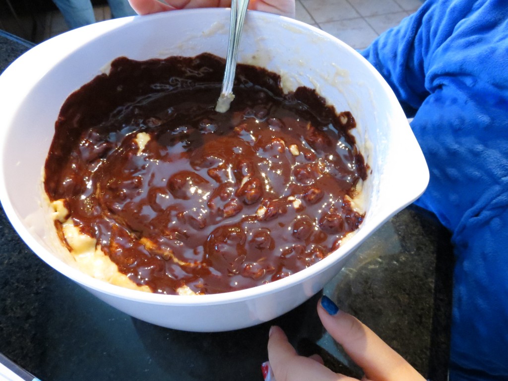 Swirling the melted chocolate into the batter got me a few ooohs and aaahs.  And can I lick the spoon?