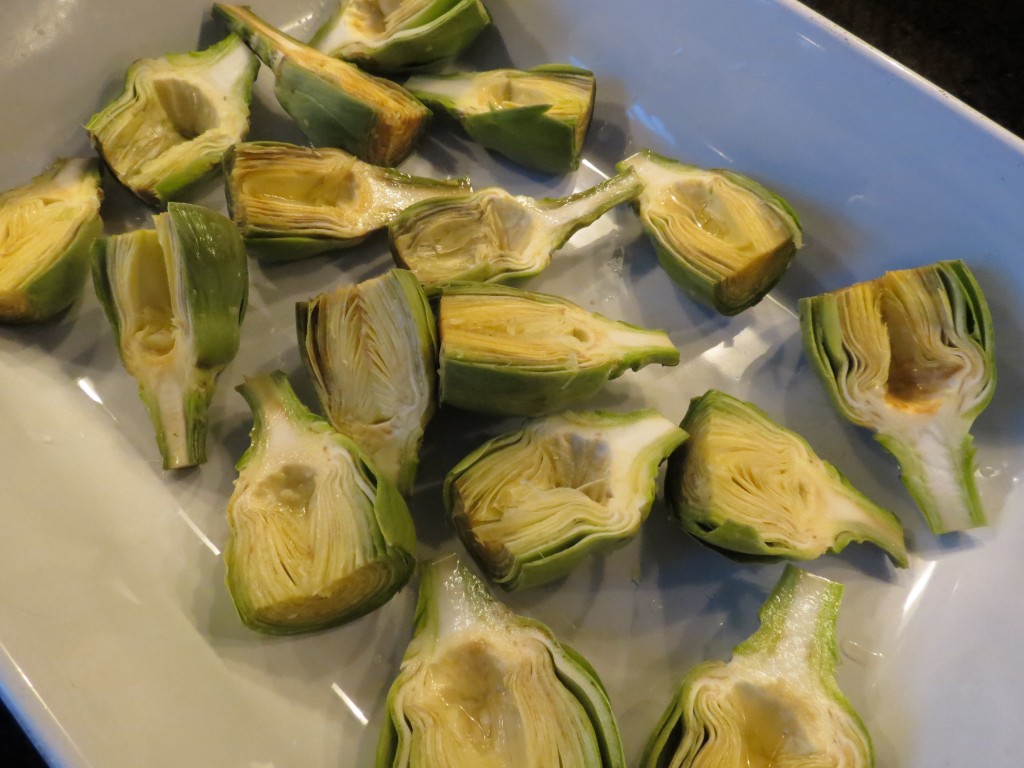Here are the prepared artichokes, waiting for their gulp of wine before being roasted in the oven.