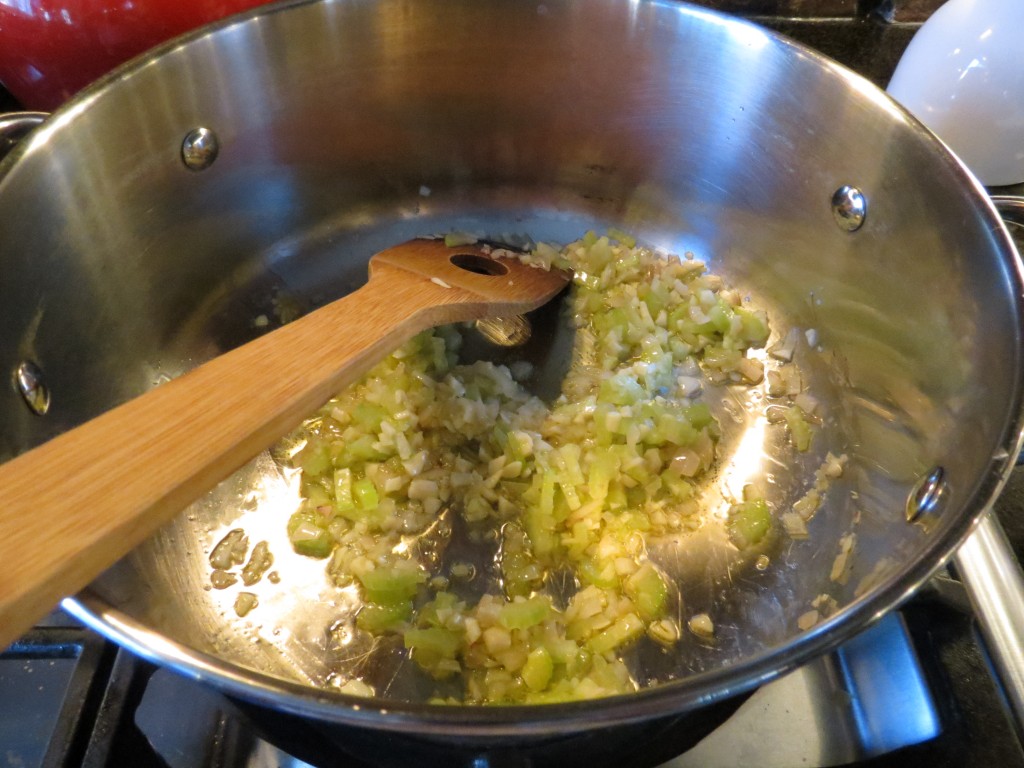 A good tomato sauce has simple ingredients.  Here I start with some onion and celery in some good olive oil.