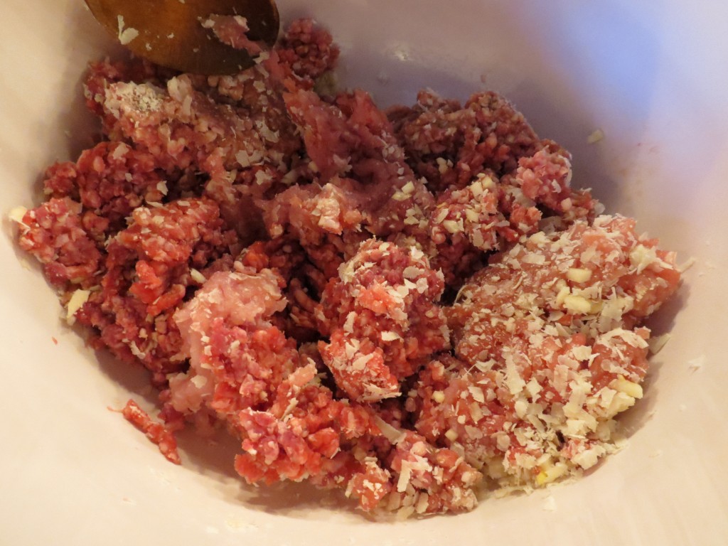 Meatloaf mix, grated Parmesan and minced garlic.  Simple.  Simple.  Simple.