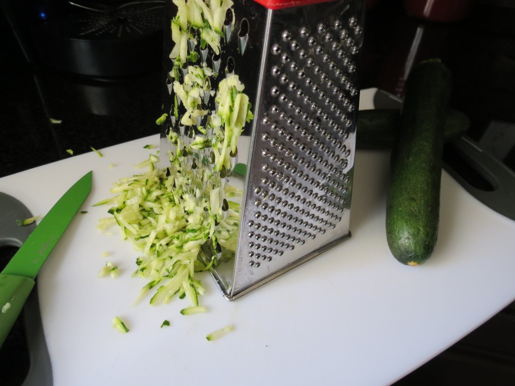 Freshly grated zucchini is going to meet chocolate in a few moments.  I'm excited.
