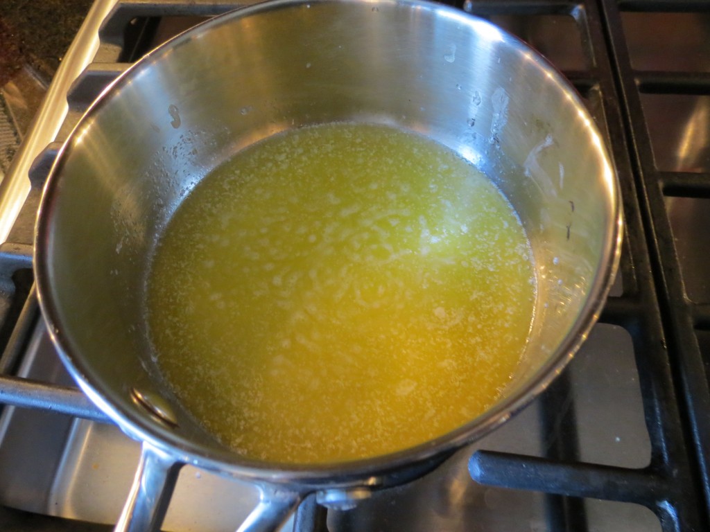 First you start by melting the butter.  Once melted, it will start sputtering a bit, so be careful, and keep swirling the melted butter in the pan.