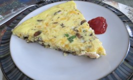 A nice wedge of frittata with a side of ketchup.  It's a must in our home.
