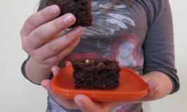 We couldn't wait until they were cooled down to slice into them.  Warm brownies equals happy child.  In all of us.